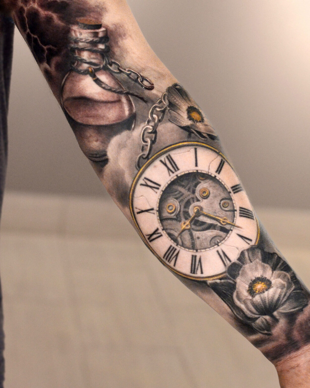 forearm clock tattoo