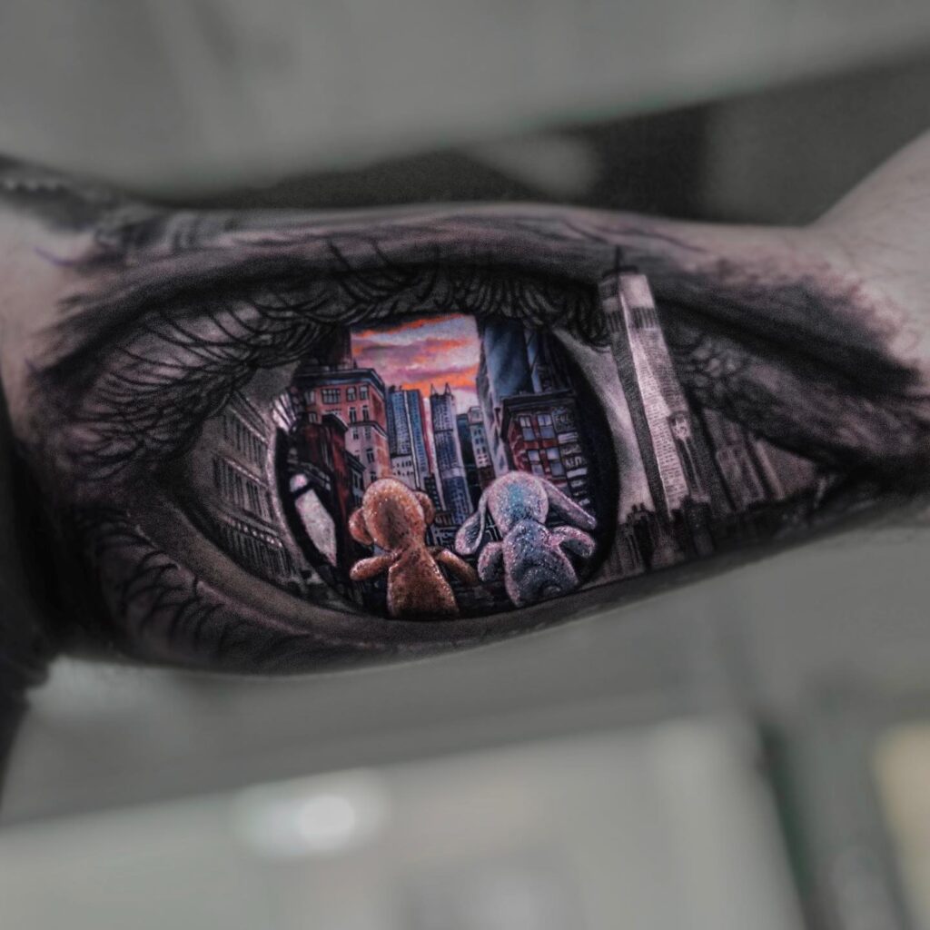 eye tattoo on arm
