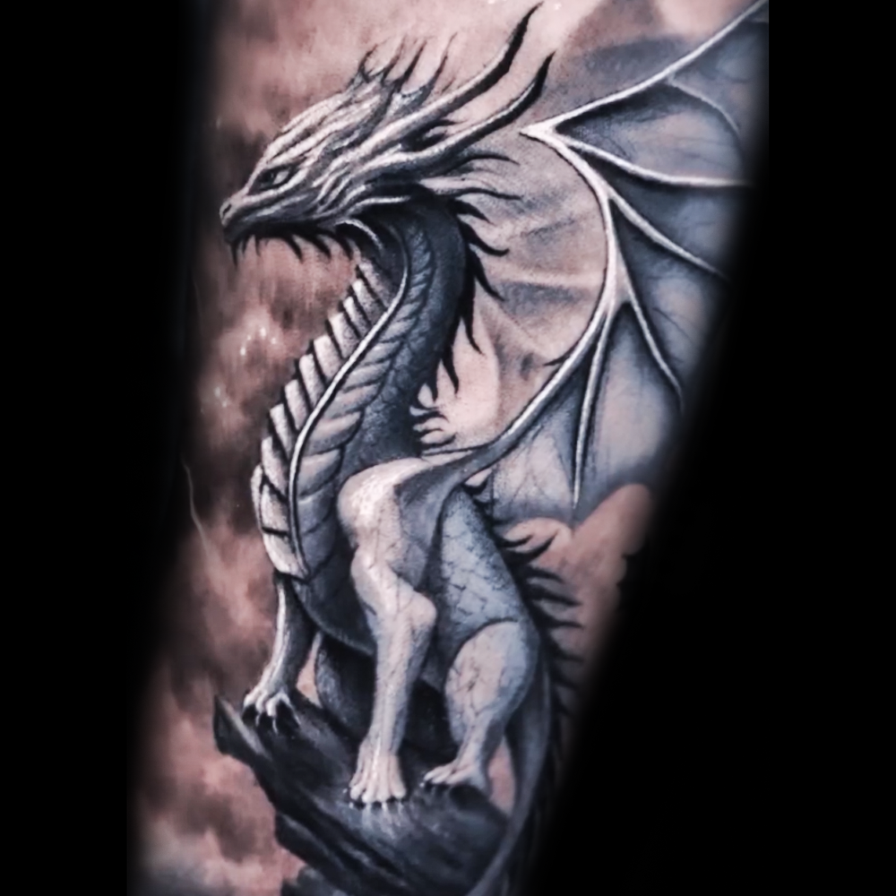 Tattoo design of a majestic dragon and blooming saku...