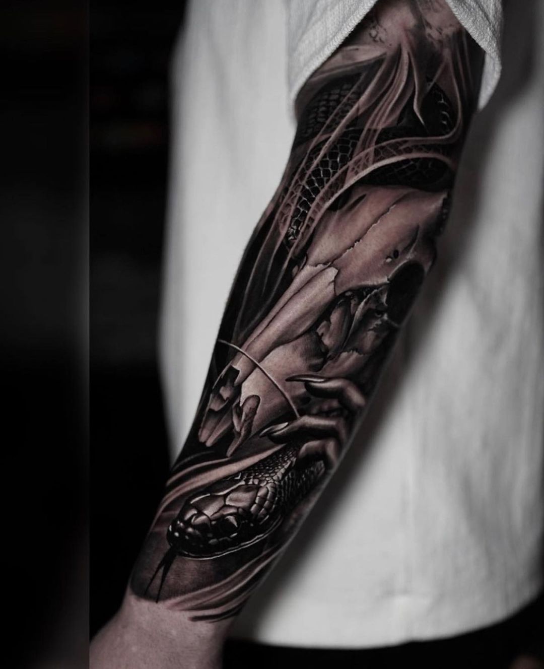 Snake tattoo - Visions Tattoo and Piercing