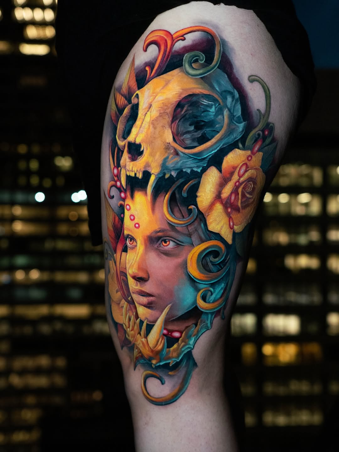 Color realism tattoo with female portrait, skull, flowers and vibrant fantasy elements by Inknation Studio NYC