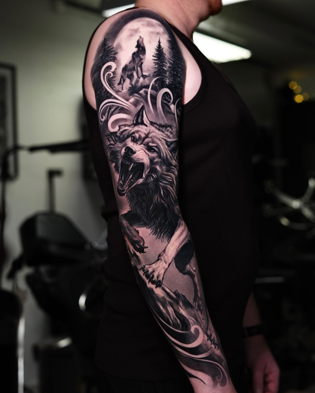 celestial wolf moon symbol tattoo.jpg tattoo by Inknation Studio NYC.realism-tattoo-arm