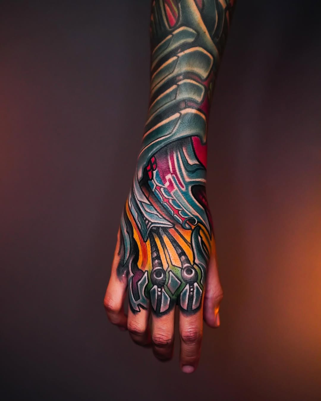 Color biomechanical hybrid hand tattoo with tendrils and gears, organic-mechanical fusion, Inknation Studio
