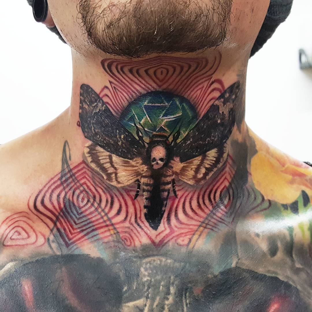 Death head moth tattoo on neck with psychedelic geometric patterns and skull, Inknation Studio