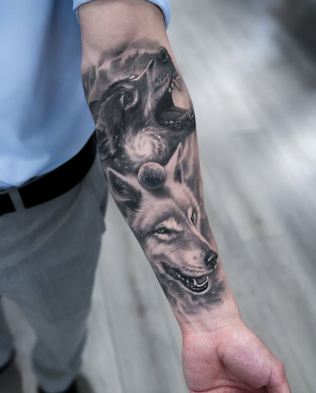 realism wolf forearm tattoo moon tattoo by Inknation Studio NYC.realism-tattoo-arm