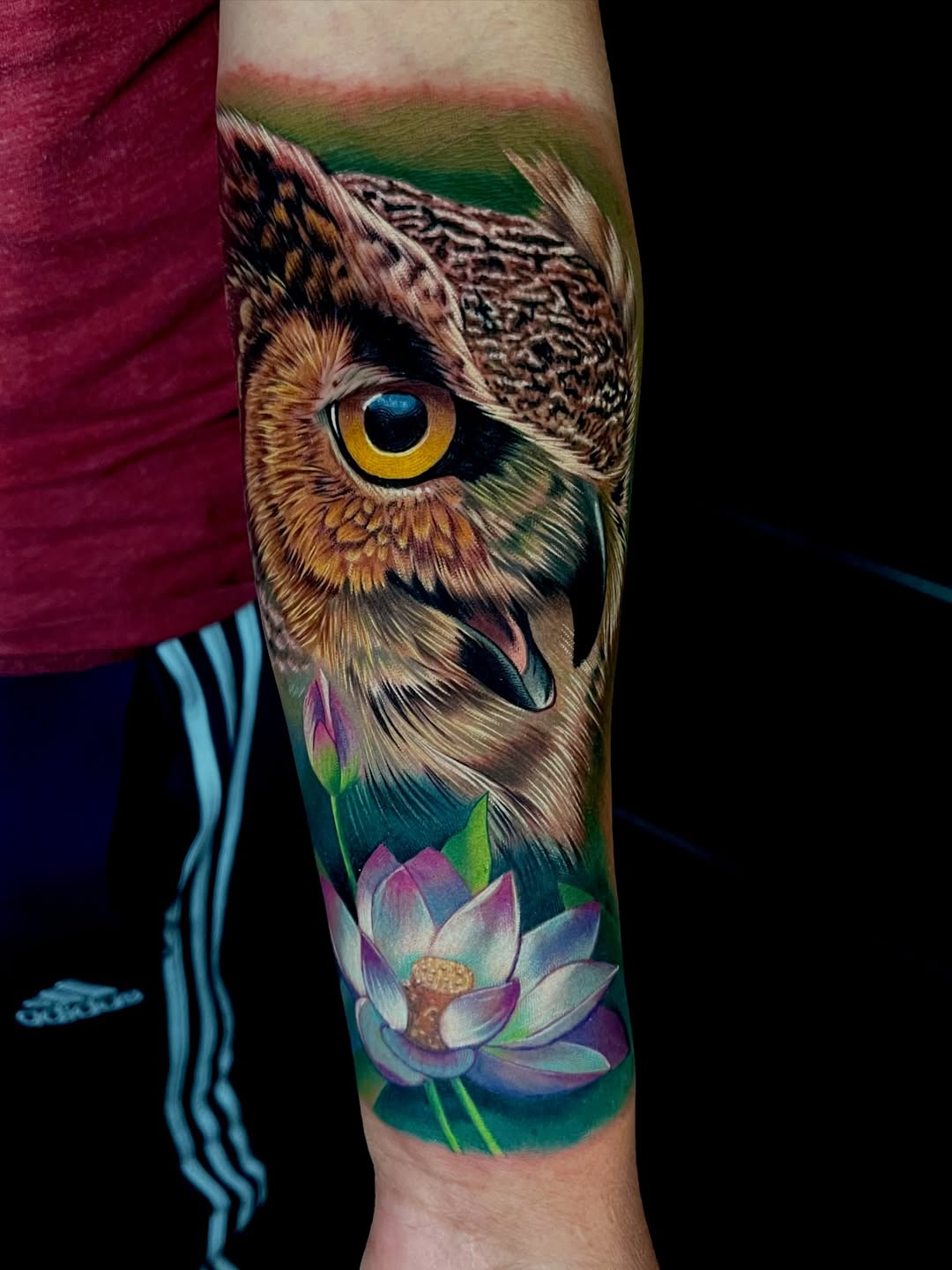 realistic owl tattoo forearm lotus color nyc inknation studio.jpg tattoo by Inknation Studio NYC.realism-tattoo-arm
