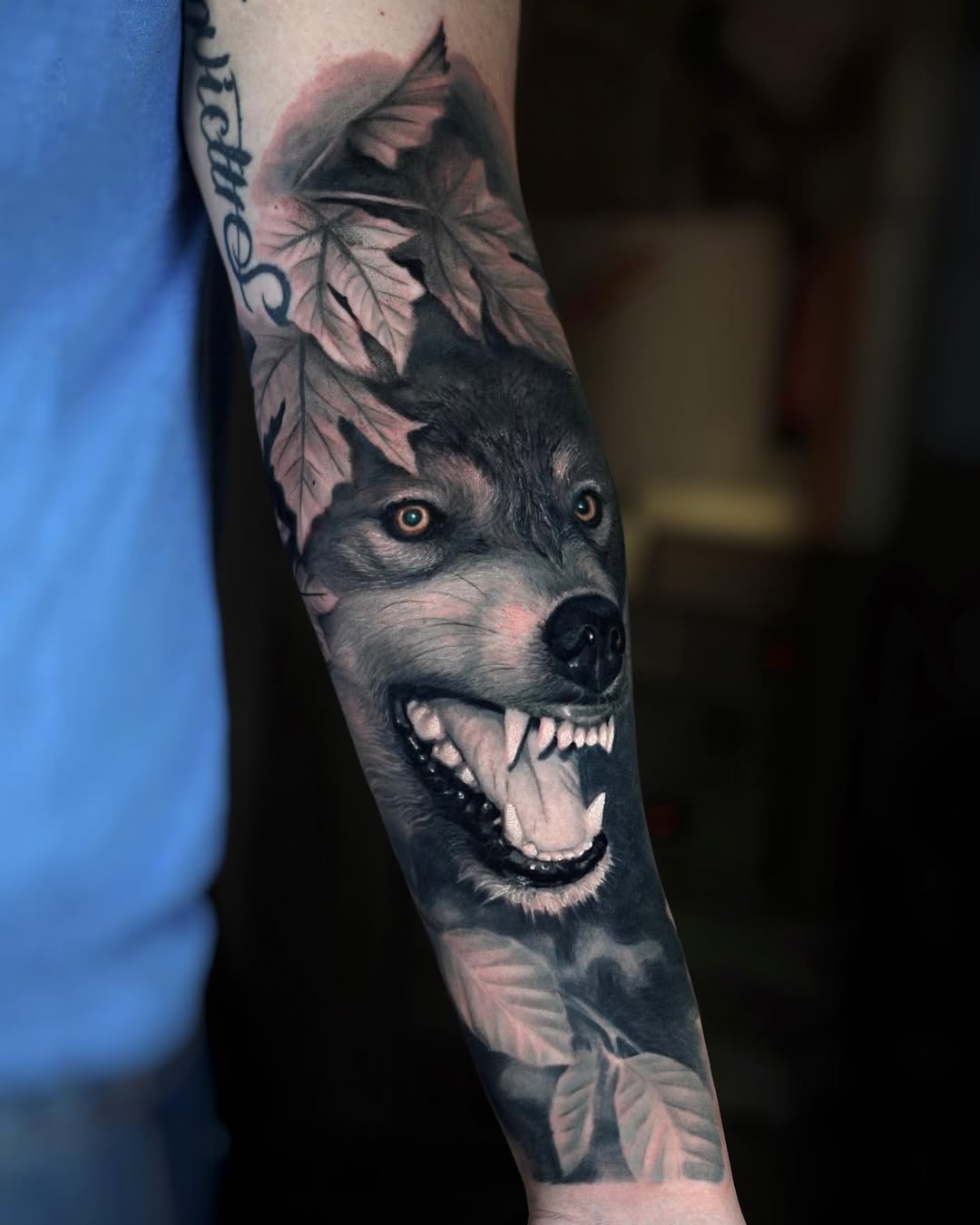 wolf tattoo autumn leaves .jpg tattoo by Inknation Studio NYC.realism-tattoo-arm